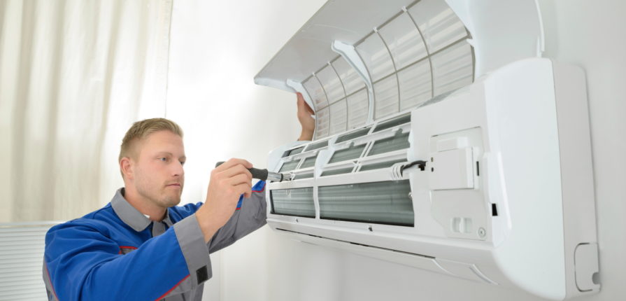 Repairer Repairing Air Conditioner